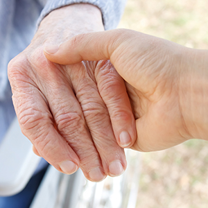 Bild Sozialdienst hält Hand von Patient